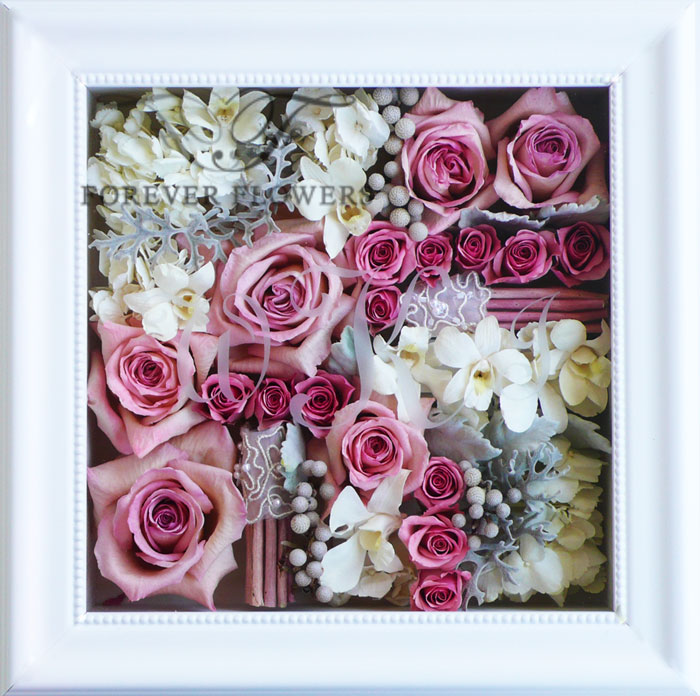 Pavé design with mixed flowers in white beaded frame